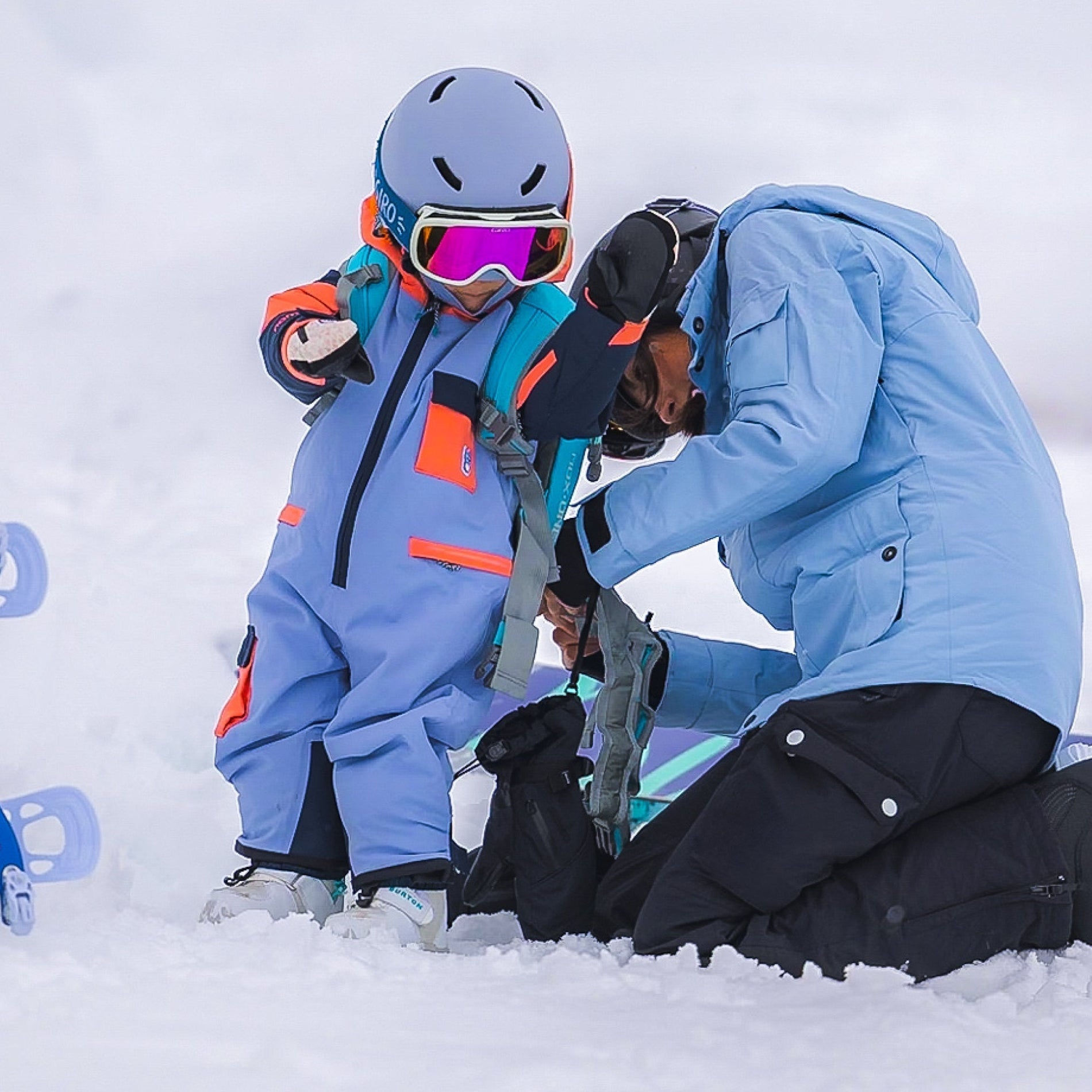 Wie bringe ich meinem Kind das Snowboarden bei?